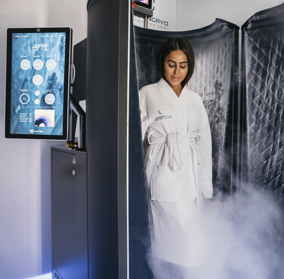 Girl inside cryotherapy machine