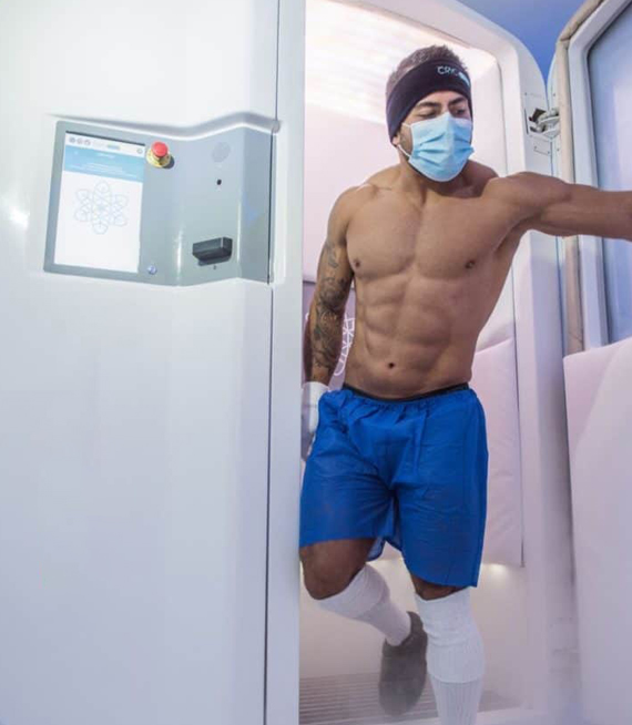 Girl standing near cryotherapy machine